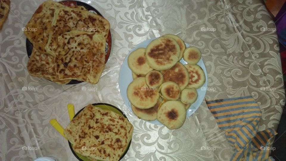 Various bread on table.