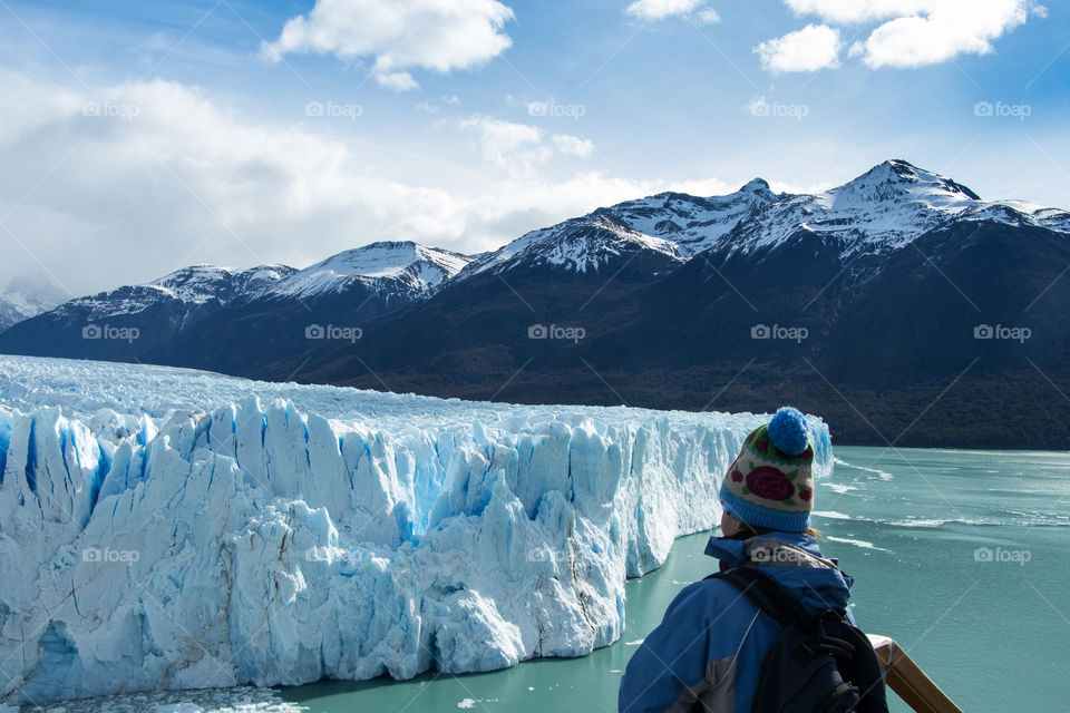 Women looking at perito moreno glacier