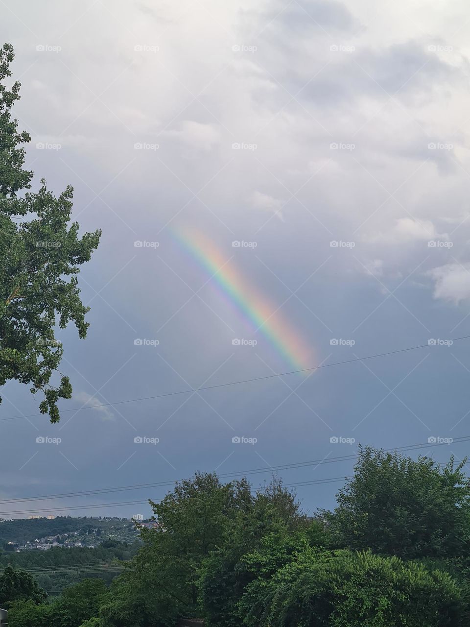 A beautiful half-rainbow that appeared in the sky while I was outside. ☀️🌈
