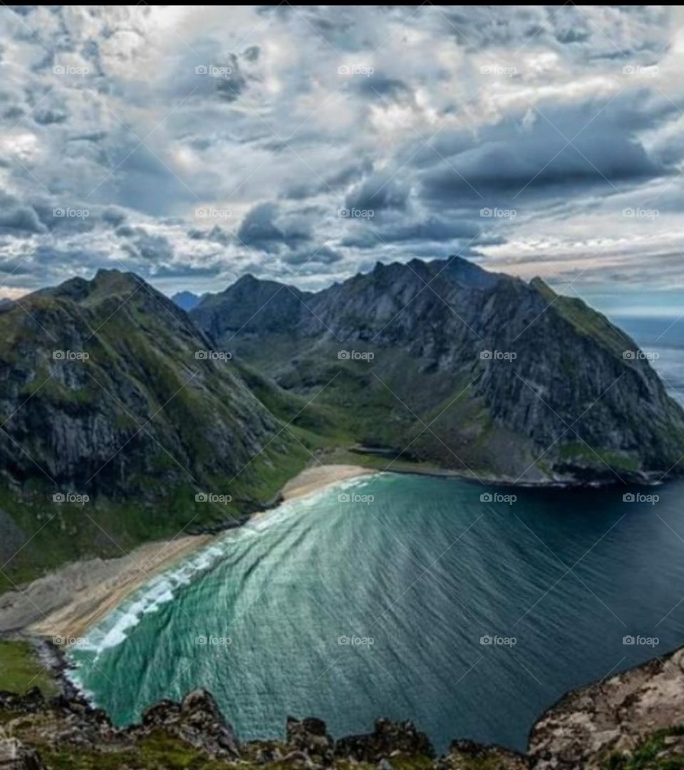 This is a picture of sea and mountain