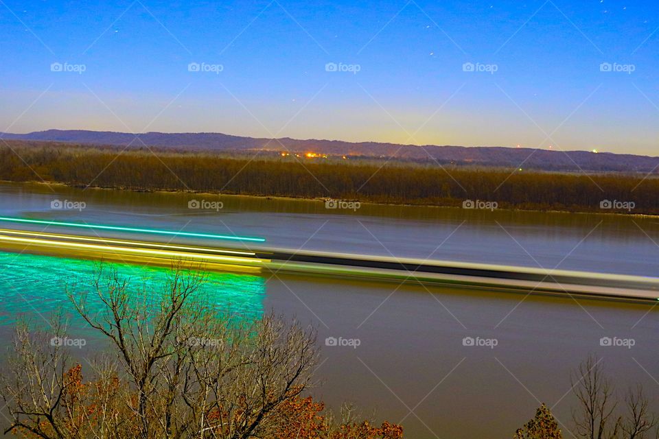 A barge cruising down the river by trail of tears 