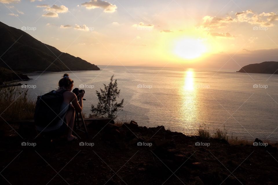 Photographer and her sunset