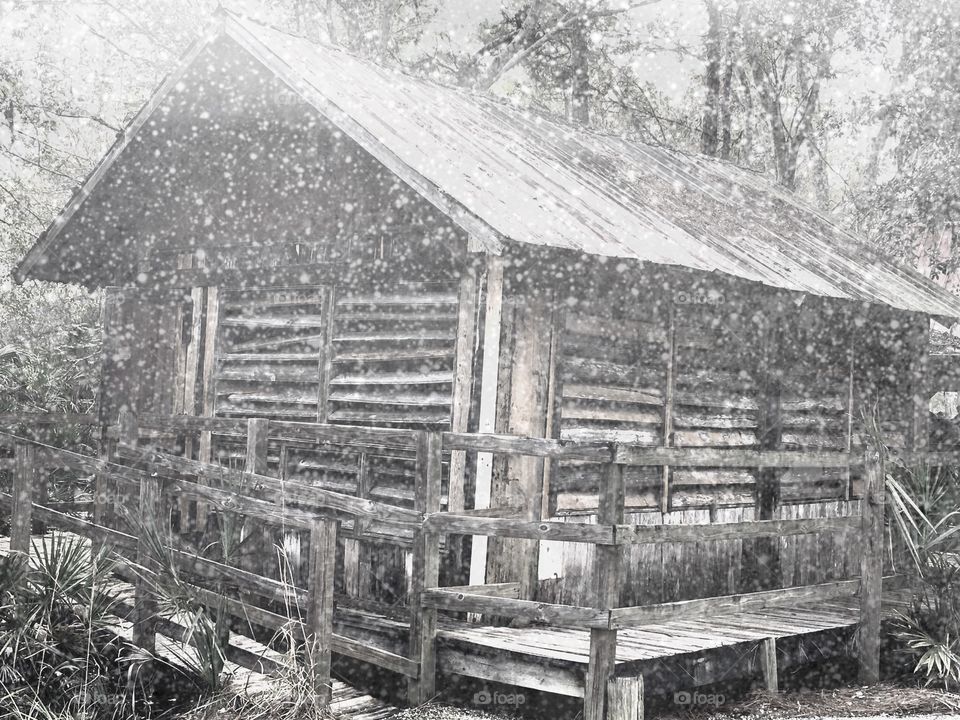 Old cabin in the snowstorm 