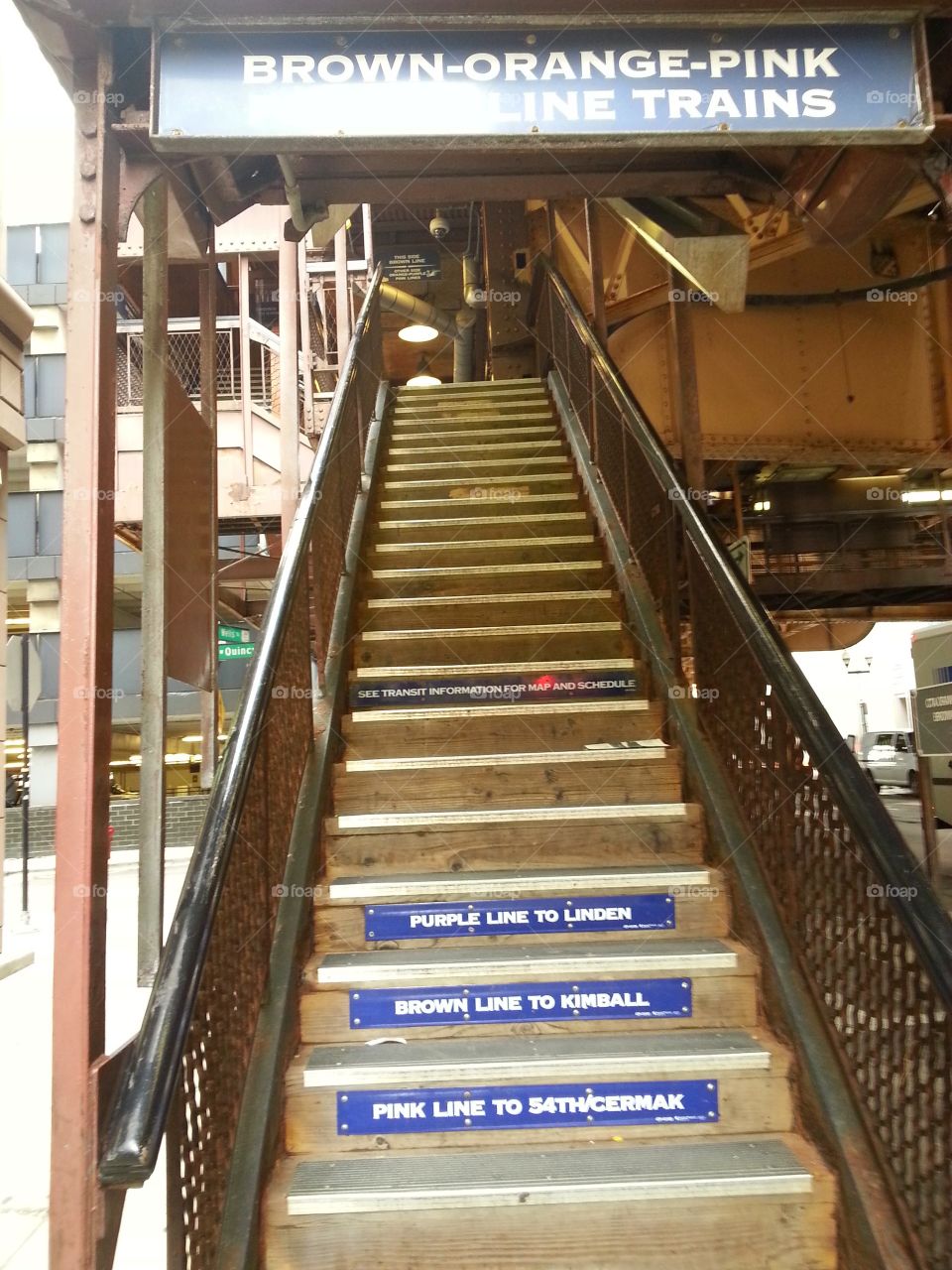 Stairs going up to a Subway platform in downtown Chicago.