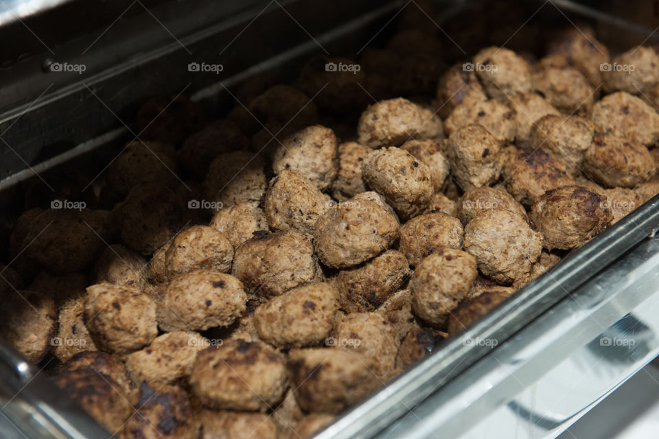 Swedish Meatballs on a Christmas buffet. This is one of the dishes that are part of the traditional Swedish Christmas buffet.