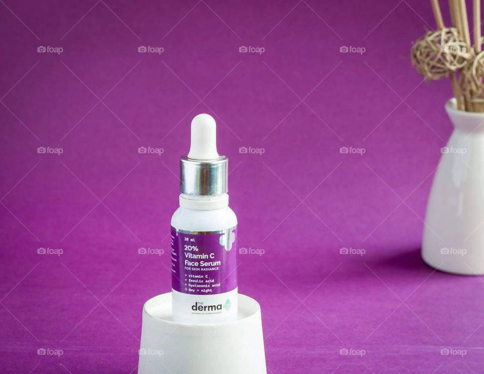 The dermaco vitamin c face serum with lavender color label.