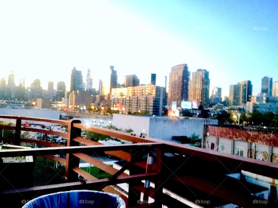 A Newtown Creek view from atop the Pulaski Bridge in Long Island City, Queens, NY around sunset time in the summer of 2019. Hypnotic Productions