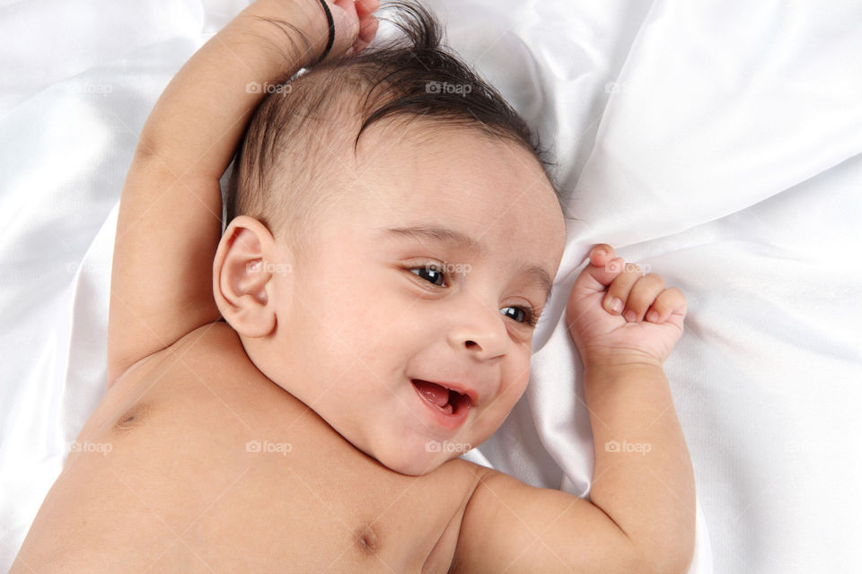 Cute little happy Indian baby boy