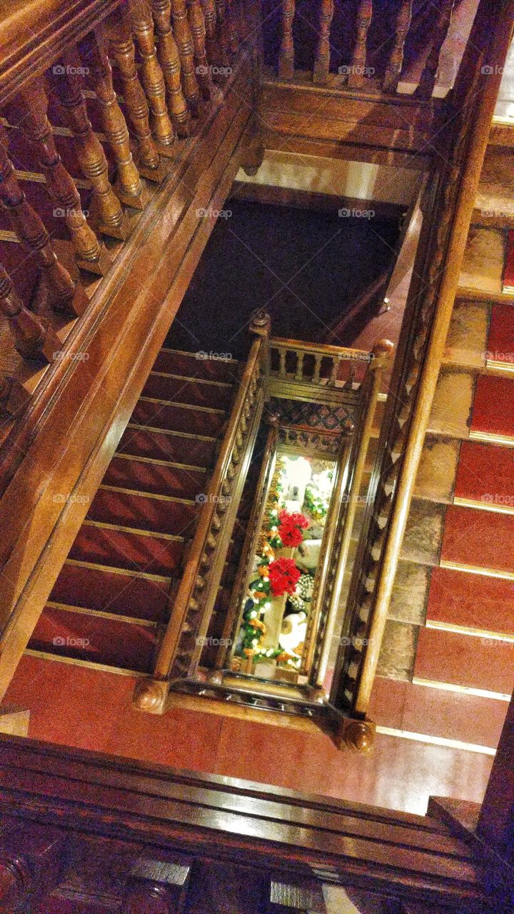 Looking down the beautiful old grand staircase of the historical Colorado Hotel.