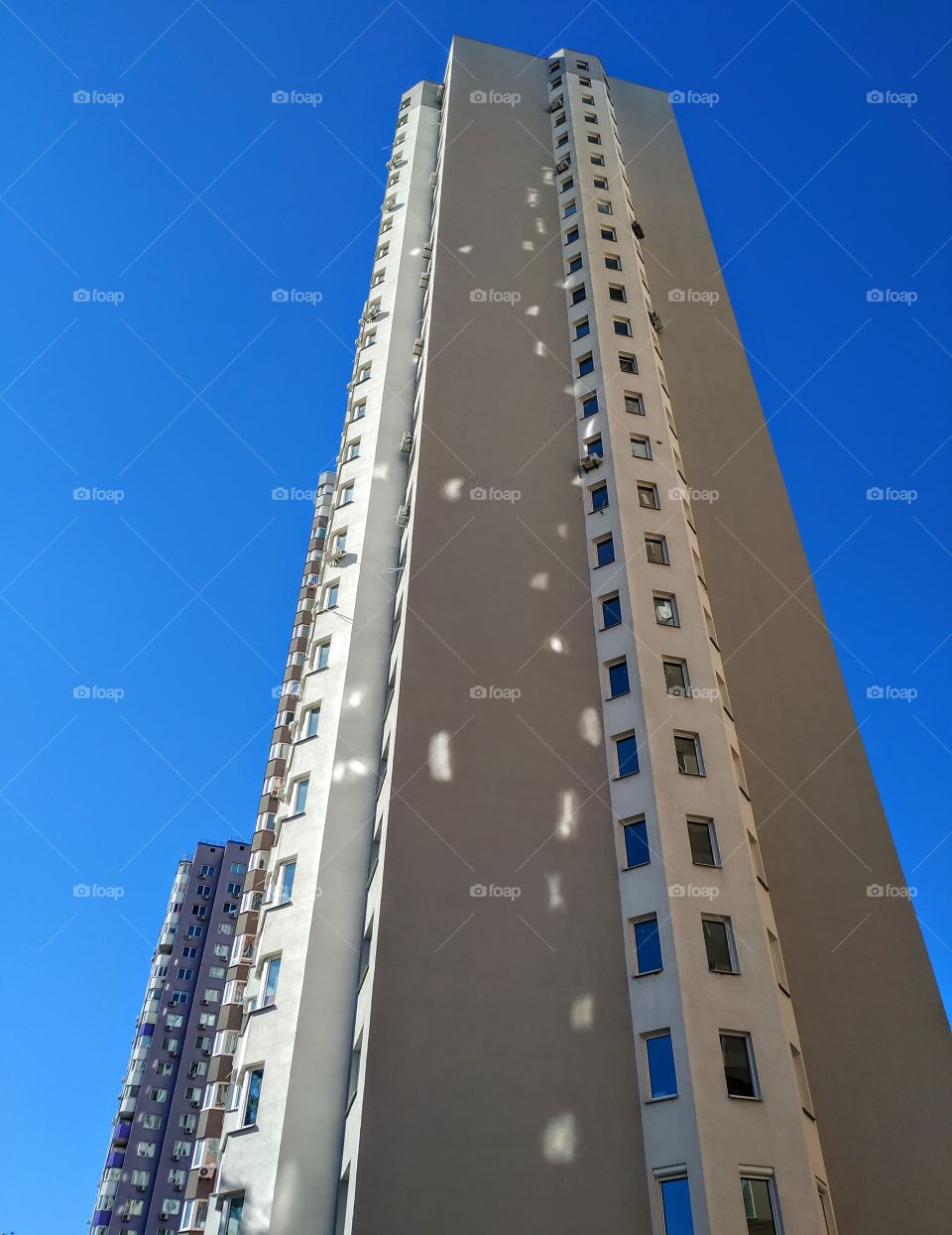 A multistory building reaches to the sky