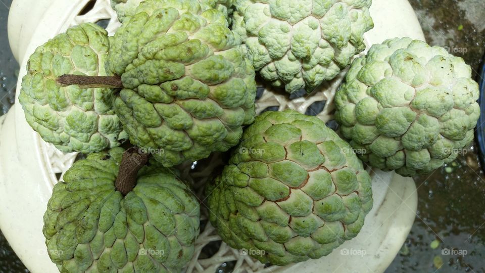 sugar apple or sweetsop as well as a custard apple