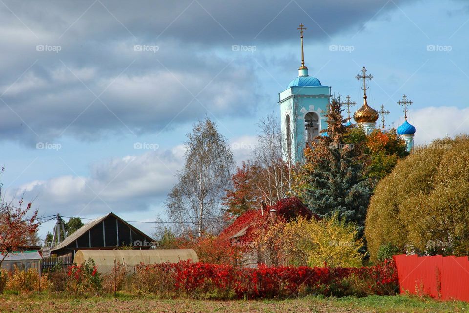 autumn landscapes and trees in colorful outfits church