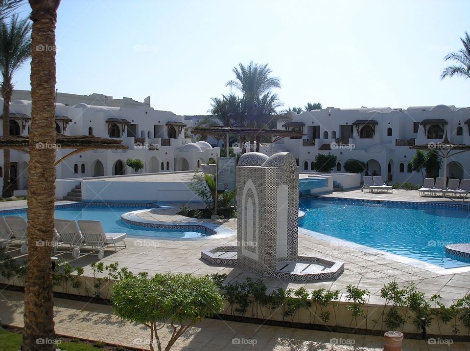 A view on territory of a luxury hotel with pools in Egypt 