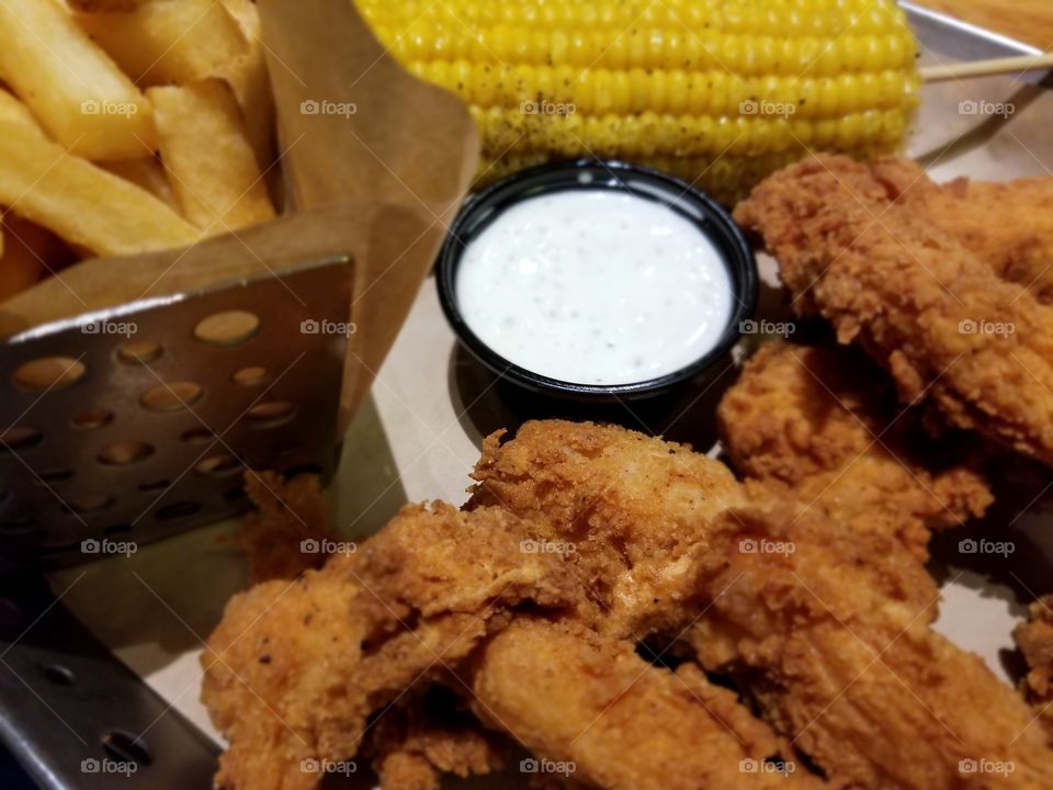 Ranch Dressing Goes With Anything Even Chili's Chicken Tenders with Fries and Corn on the Cob