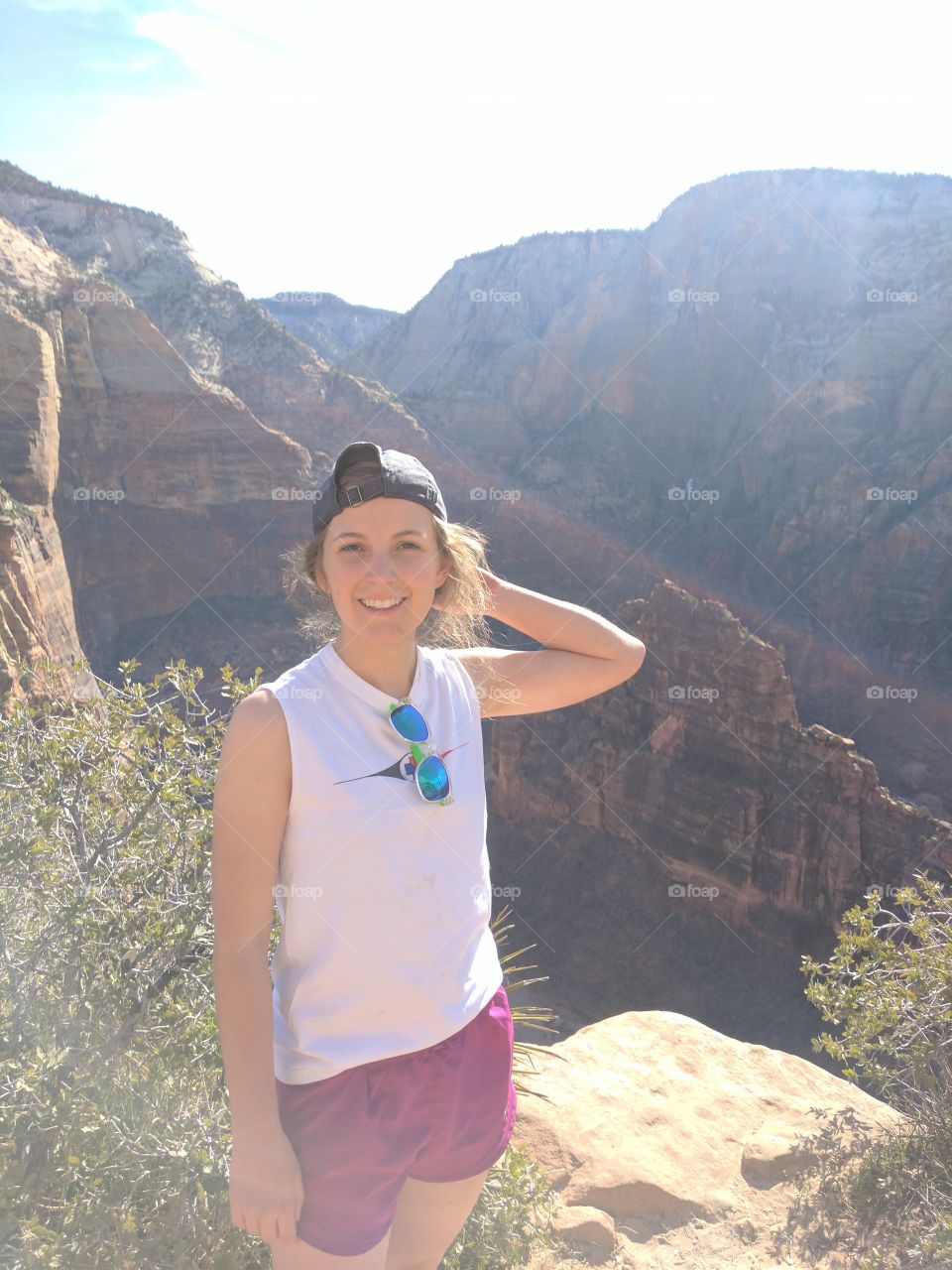 Girl at the summit of angel's landing.