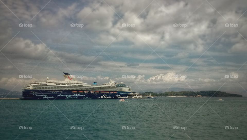 Corfu-Greece. Cruise ship waiting for the last tourists