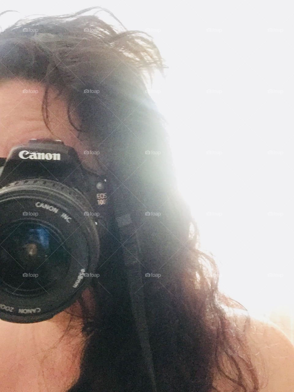 Selfie of me, NikkiNoo, backlit, with my Canon 100d