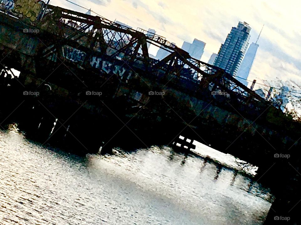 The “Borden Avenue Bridge” leads over the part of the East River at Newtown Creek in LIC, Queens, NY called “Dutch Kills”. A seldom used railroad track and another bridge is also located there. 2021. Hypnotic Productions
