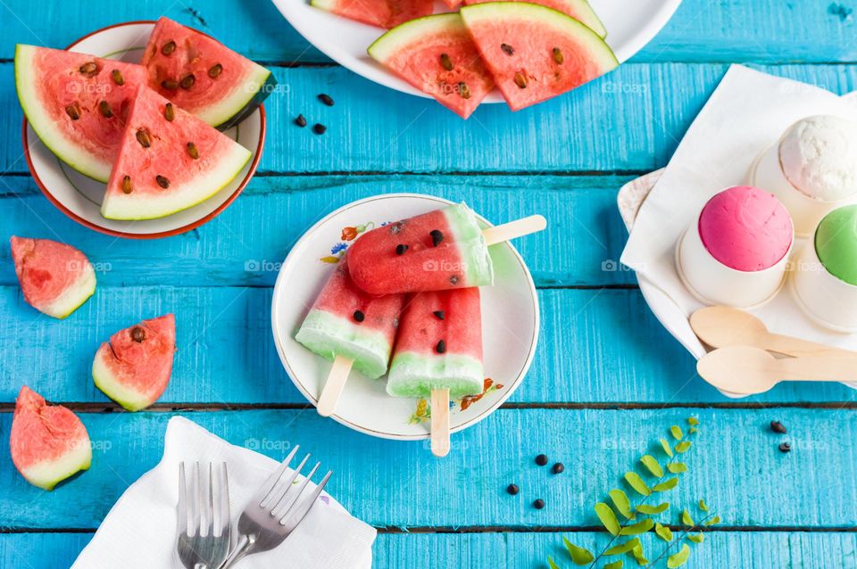 Come, let's have watermelon popsicles and slices to beat the heat.