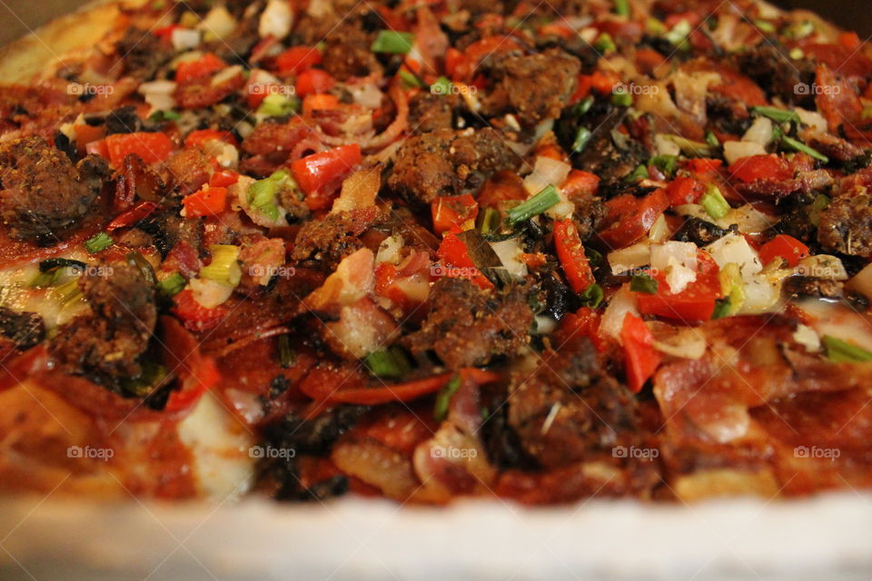 boulevard specialty pizza with added on toppings bacon and green onions @LuigisPizza