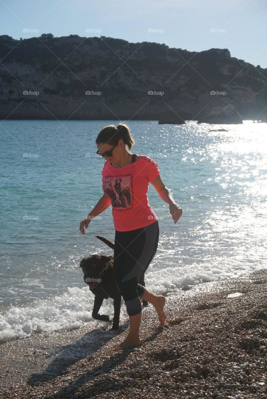 Beach#sea#human#dog