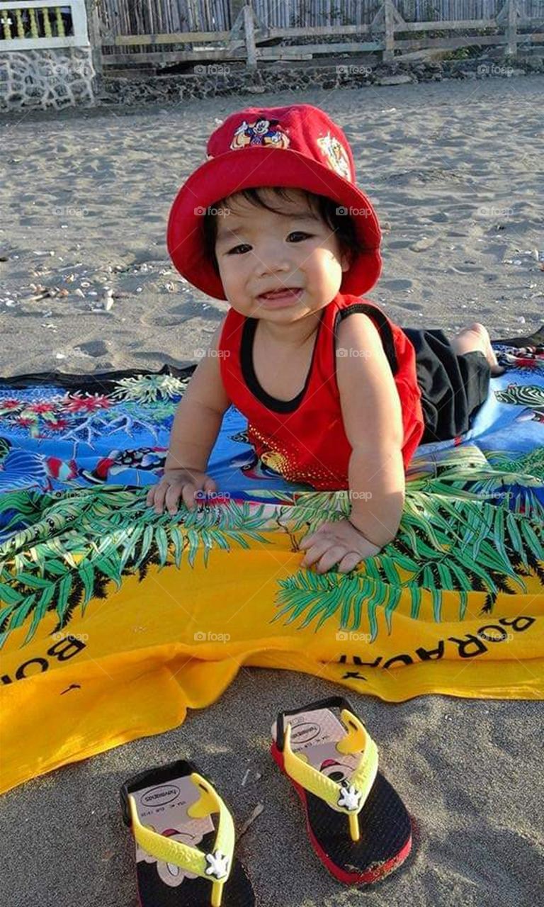 sun sand and cute baby, taking fresh ocean air, watching waves splashing like all troubles wash away, thank you God its beach day...