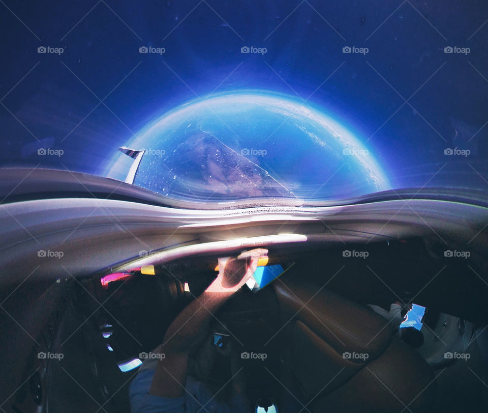 A tiny planet 360 photo from an airplane at 45,000 ft