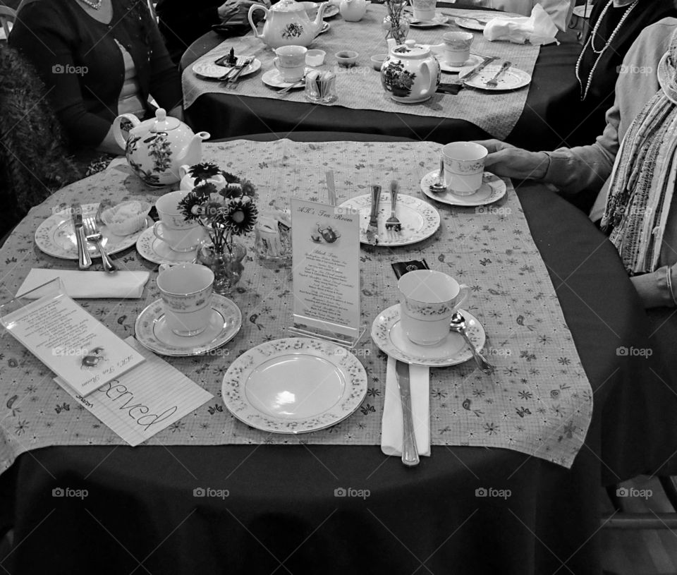 A nice tea party taking place at the downtown tea room. 