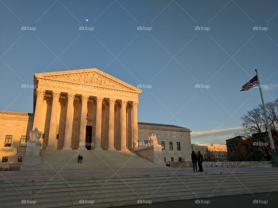 The United States Supreme Court is seen at sunset. (Image source: Jon Street Media)