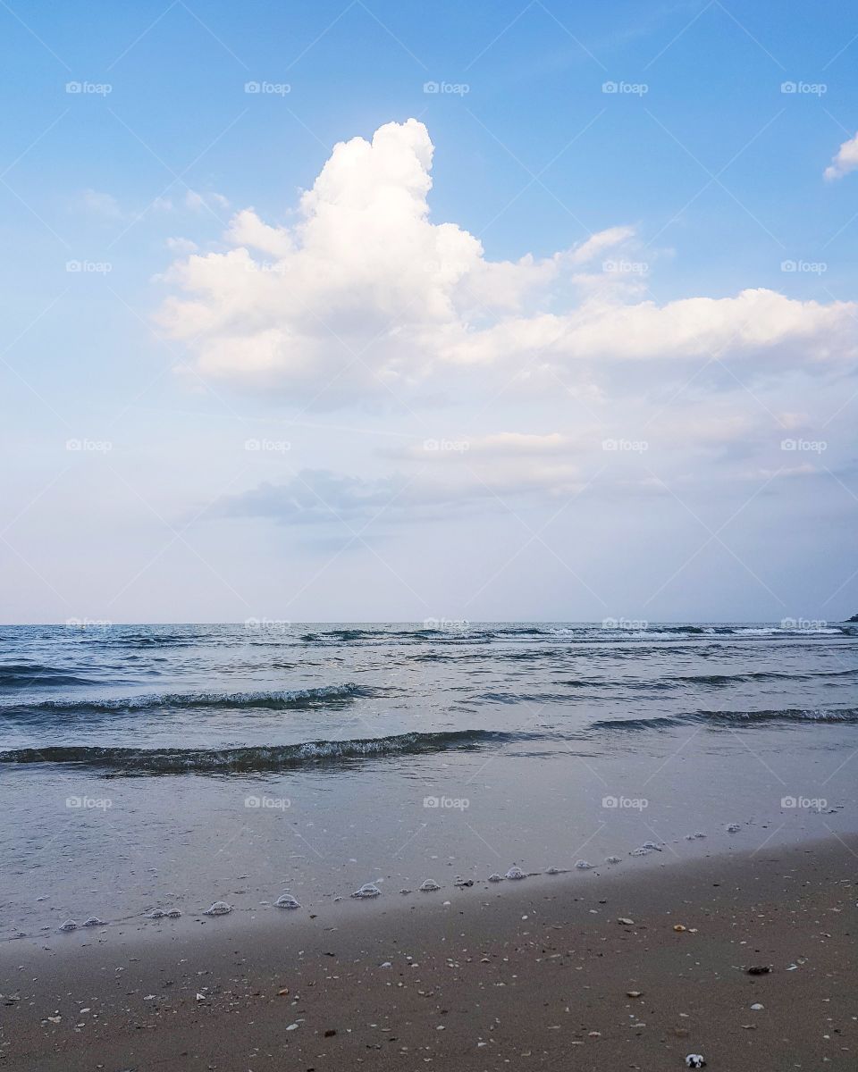 Scenic view of beach against sky