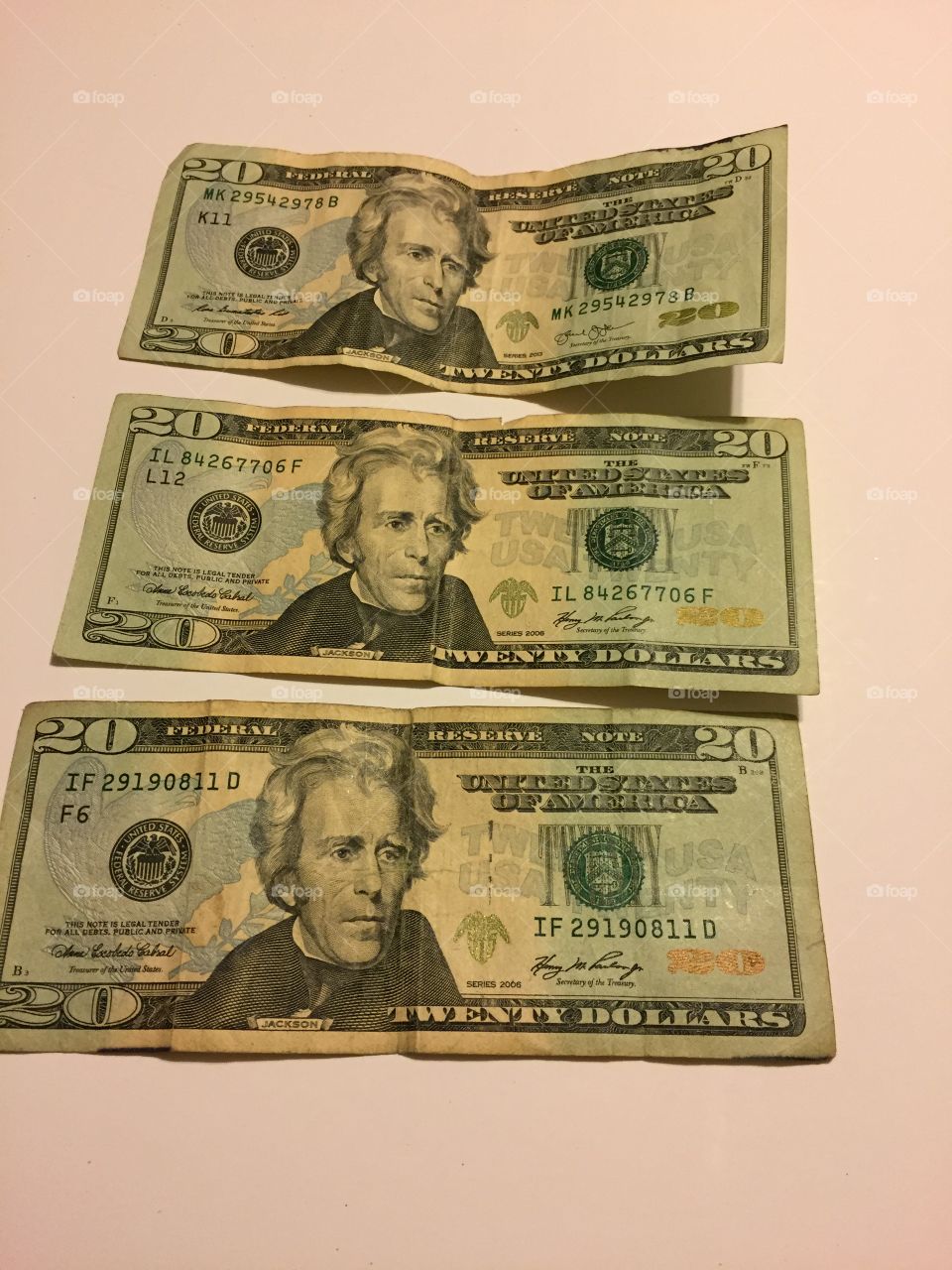 Three $20 bills