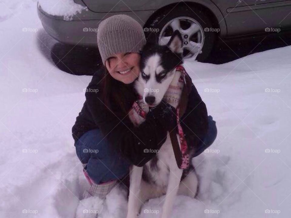 A girl, a dog, and a little snow 