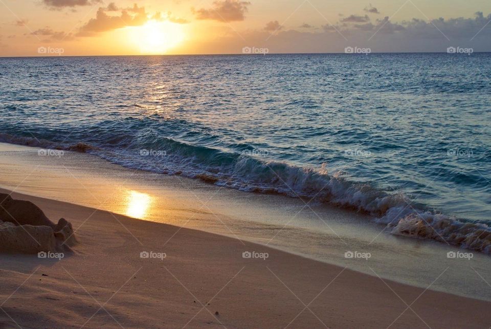 Barnes Bay beach at sunset. Little crashing waves.