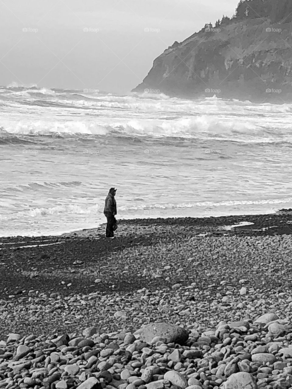 Walking along the beach collecting treasure 