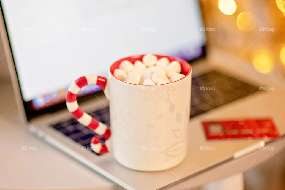 cup of coffee in a cozy festive Christmas atmosphere