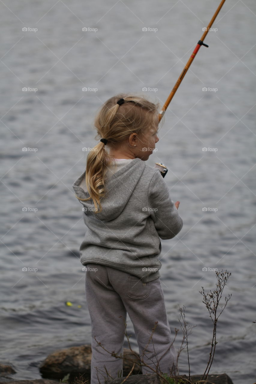 little girl fishing