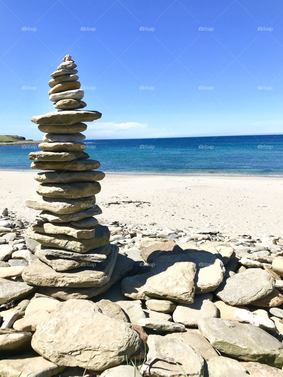 Beach with stacked stones