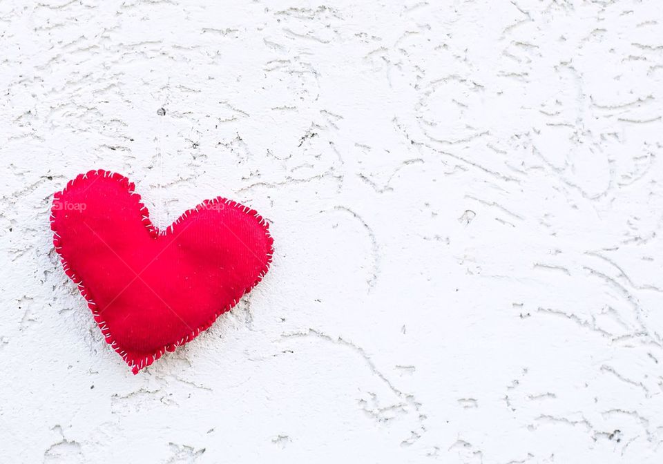 Red heart on white background