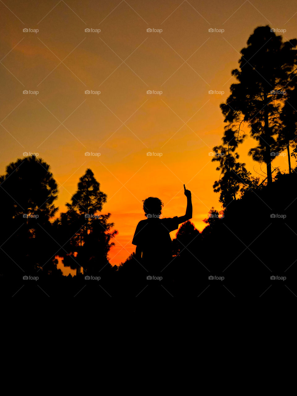 night captured, moon light, black colour, a man standing and making hand up,