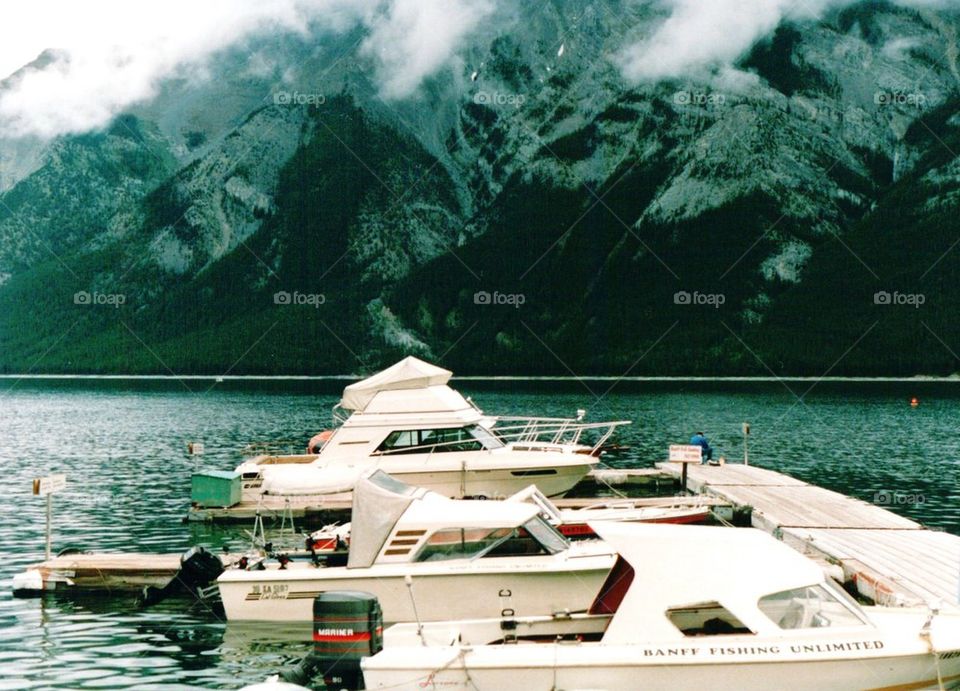 Boats on river In Banff Canada