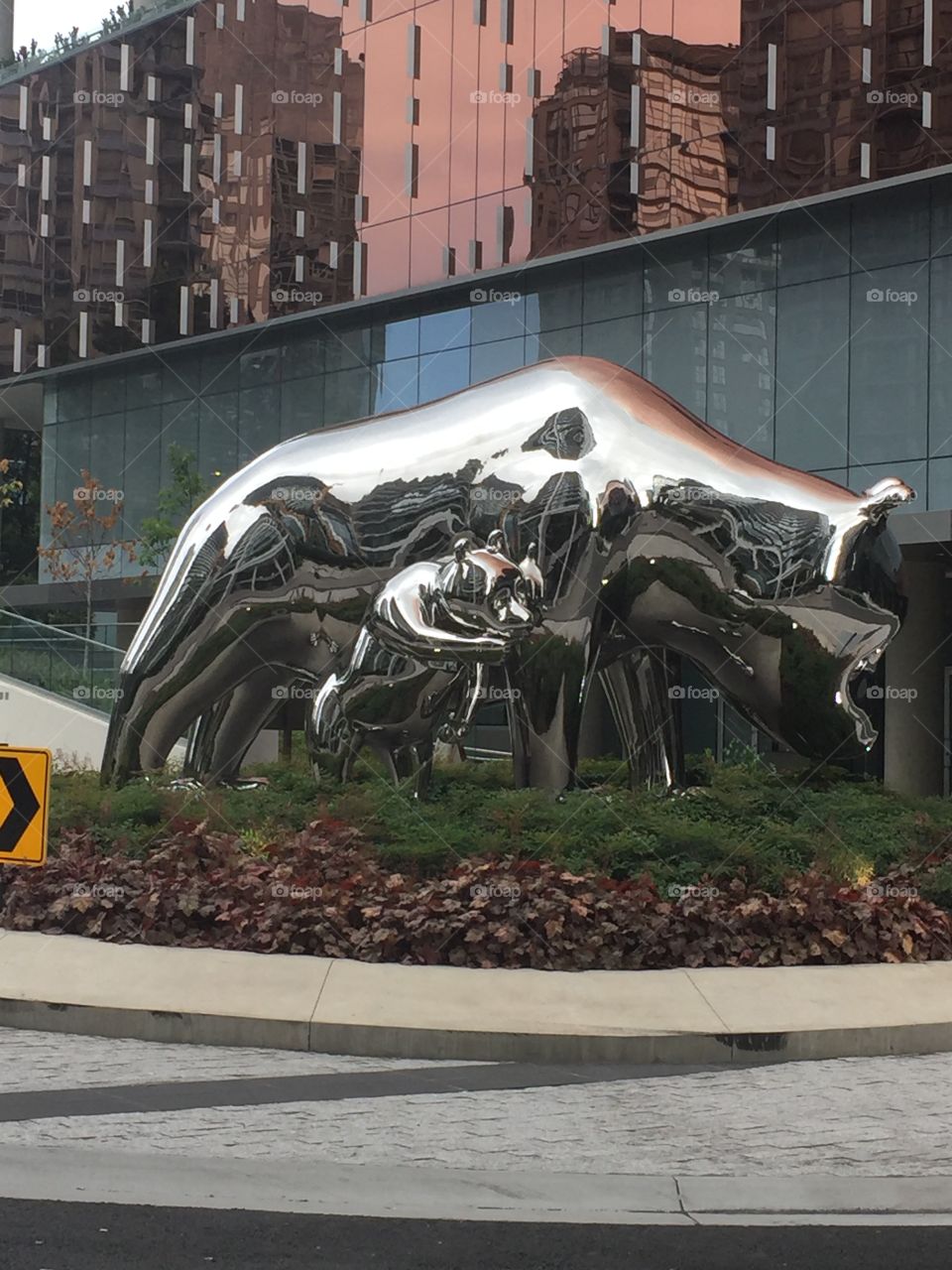 Shiny silver Momma and baby bear out front Parq Casino in downtown Vancouver, British Columbia 