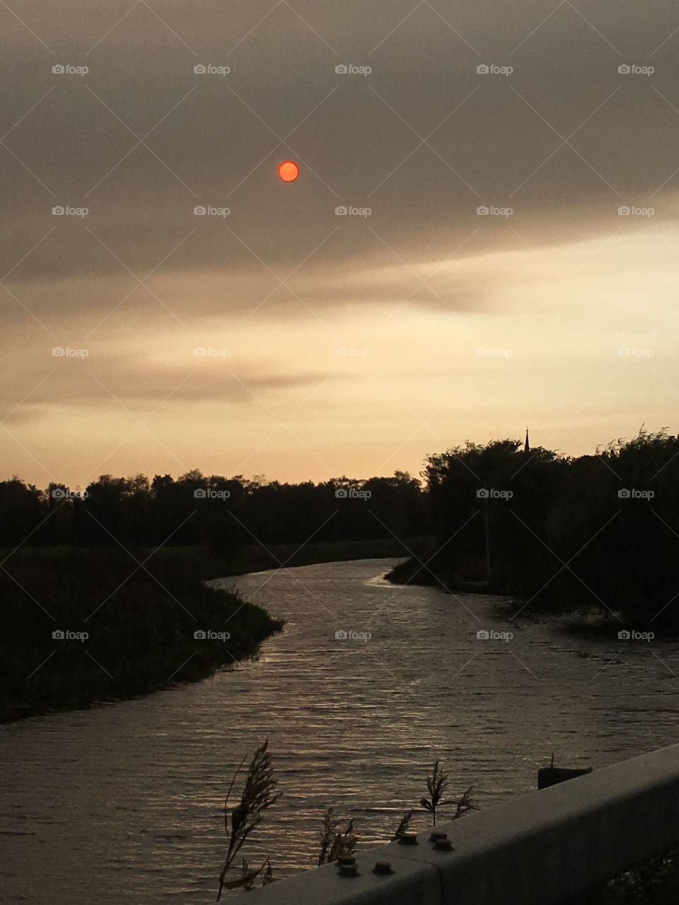 Red sun river silhouette