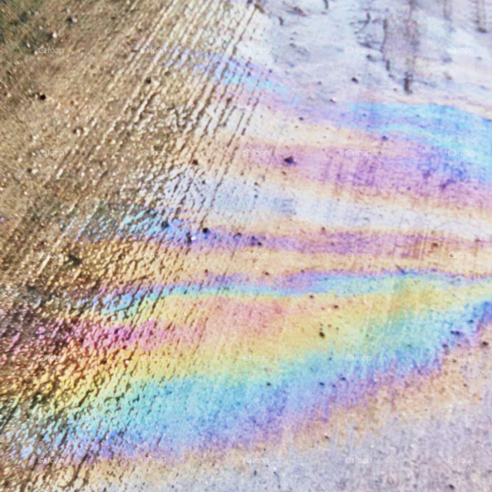 Oil spill. a rainbow is a promise of sunshine after rain, of calm after storms, of joy after sadness, of peace after pain, of love after loss