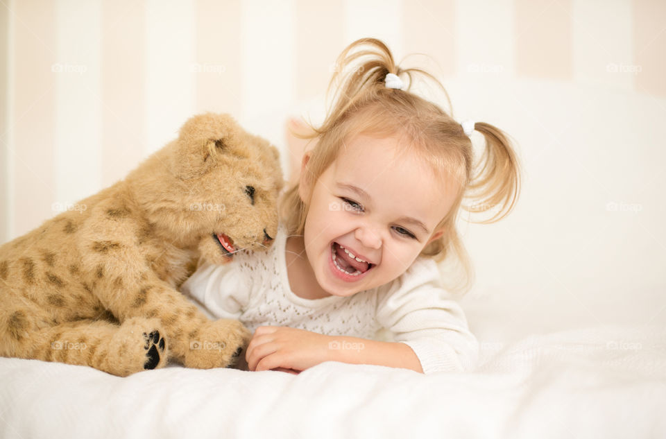 Girl playing with toy