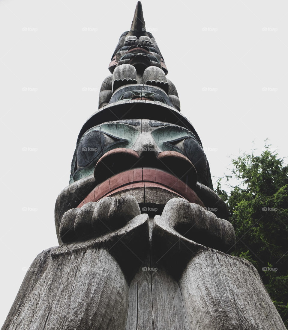 Carved totem pole in Sitka, Alaska