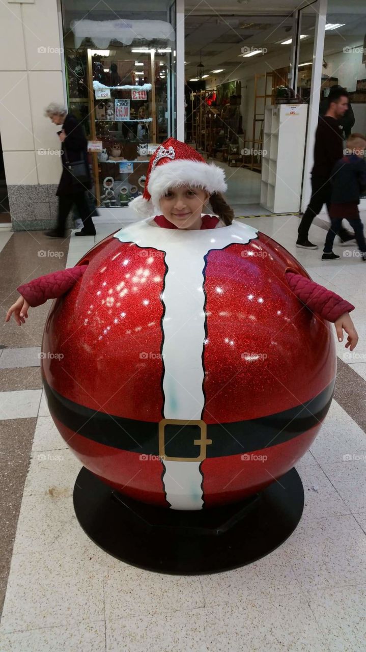 fat bauble santa suit in mall, shopping centre