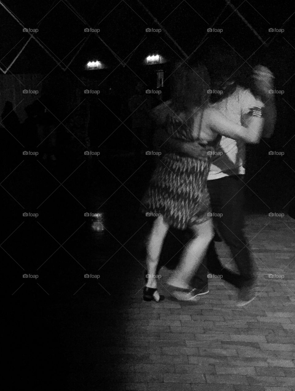 Black and white photograph of a dancing couple