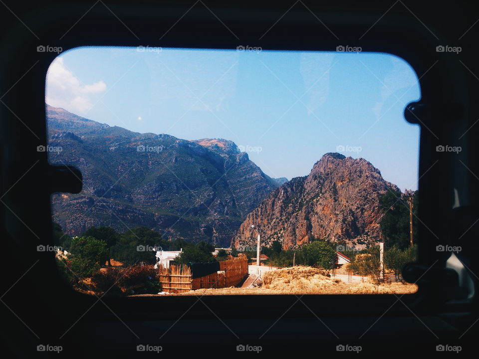 taxi window view over the mountains