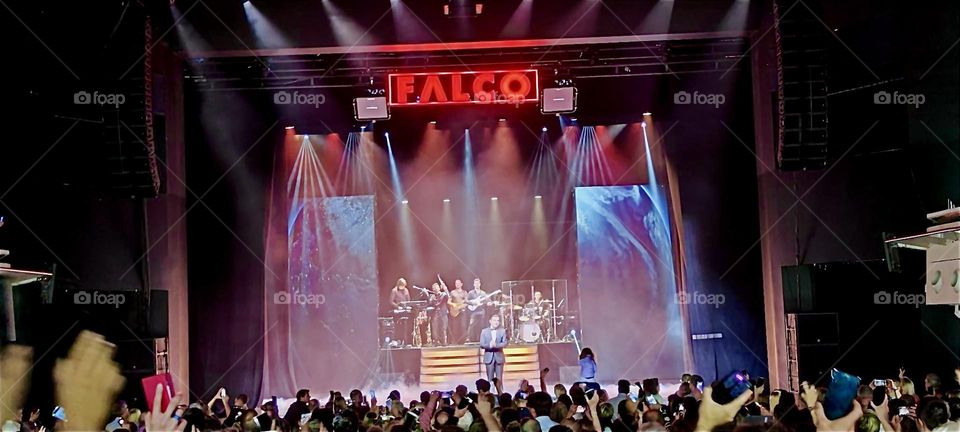 Colored lights rotate on stage at the “DEUTSCHES THEATER”, the “GERMAN THEATER” in “Munich”, Bavaria for the finale of “FALCO”, the show about the Viennese pop singer of 1980s fame for “Rock me Amadeus” and “Der Kommissar”. 2024. Hypnotic Productions