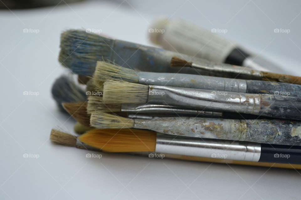 Set of painting brushes on table